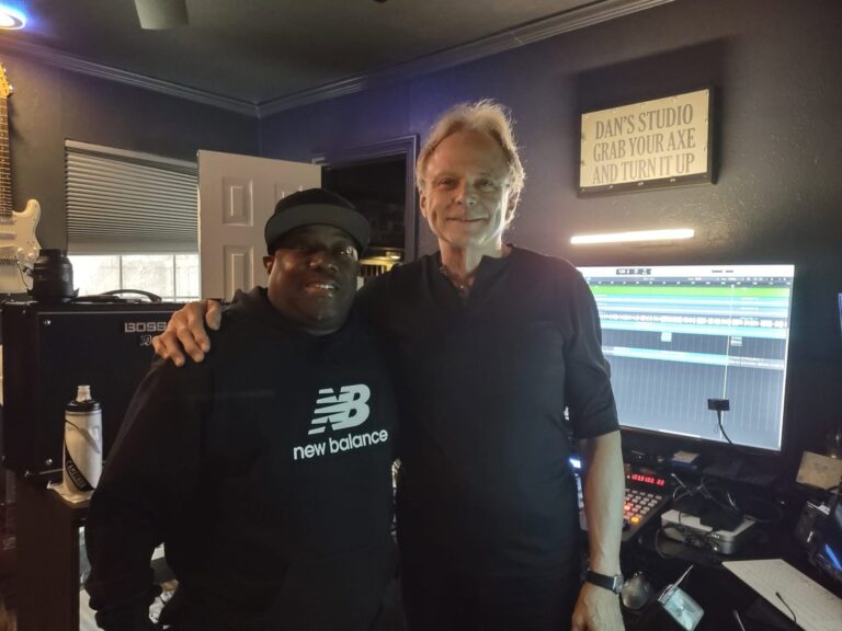 Artist and engineer together during a session in the recording suite