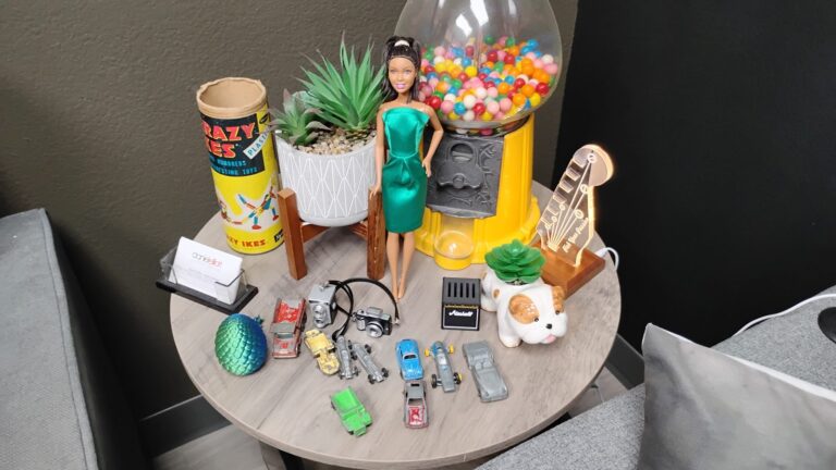 Collectibles and decor on the client lounge table